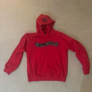 Red graphic hoodie, “calm souls” bubble fluffy print on front, design on hood